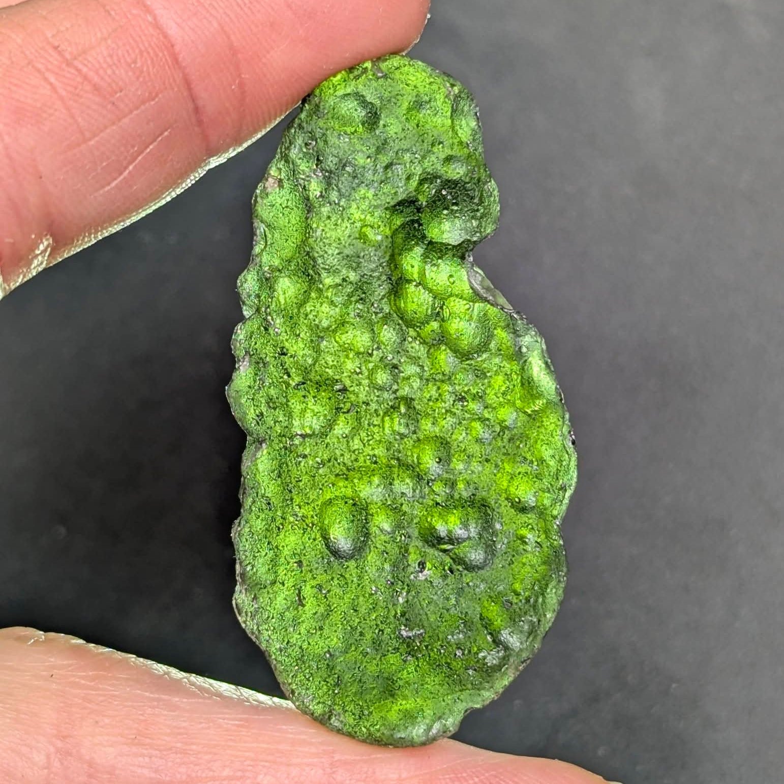 Moldavite Dolní Svince 14.4g - abraded, omleted surface, smooth flowing planes -  backlight