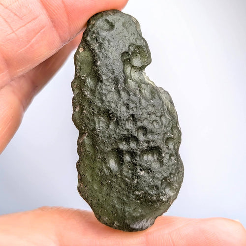 Moldavite Dolní Svince 14.4g - abraded, omleted surface, smooth flowing planes - front view