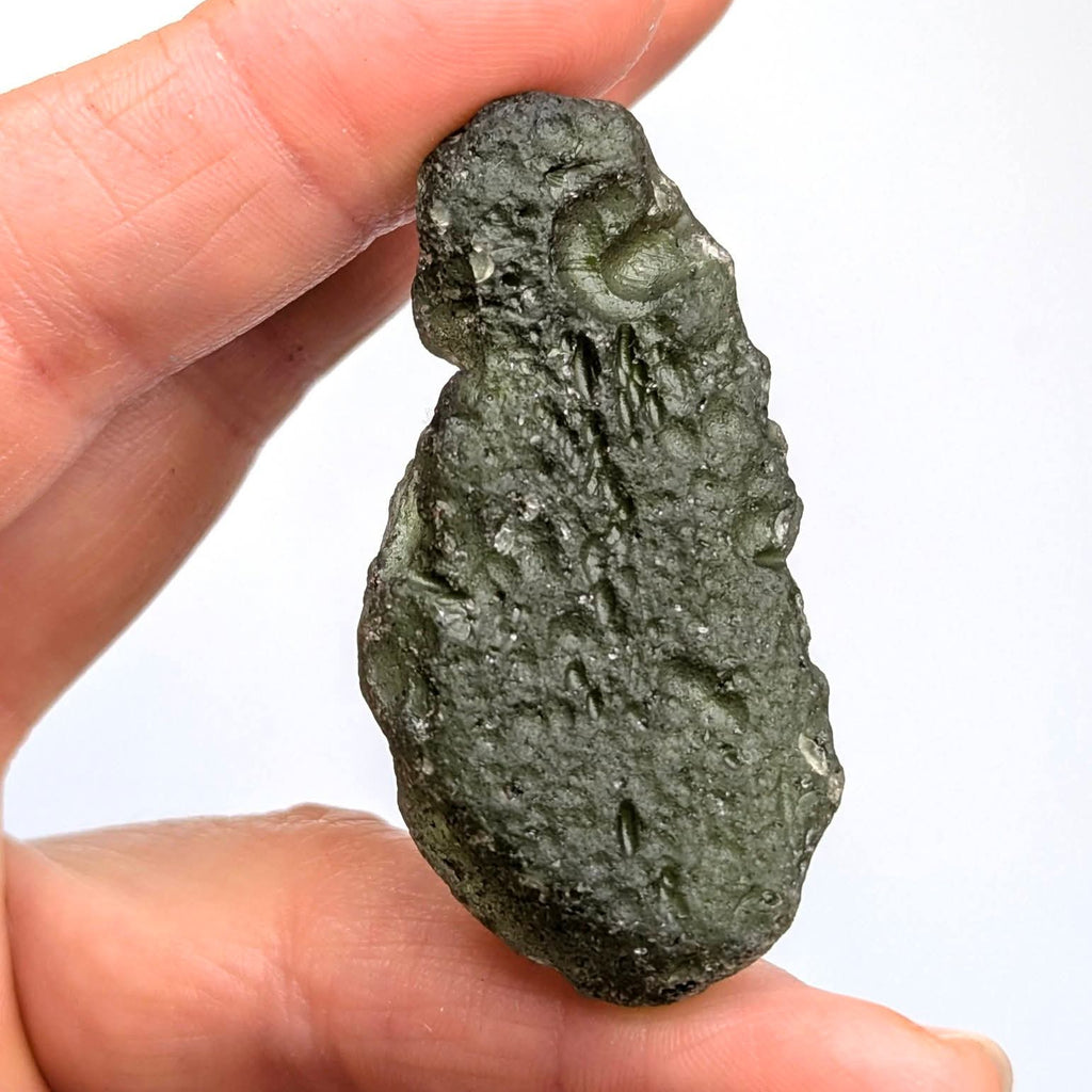 Moldavite Dolní Svince 14.4g — abraded, omleted surface, smooth flowing planes - back side