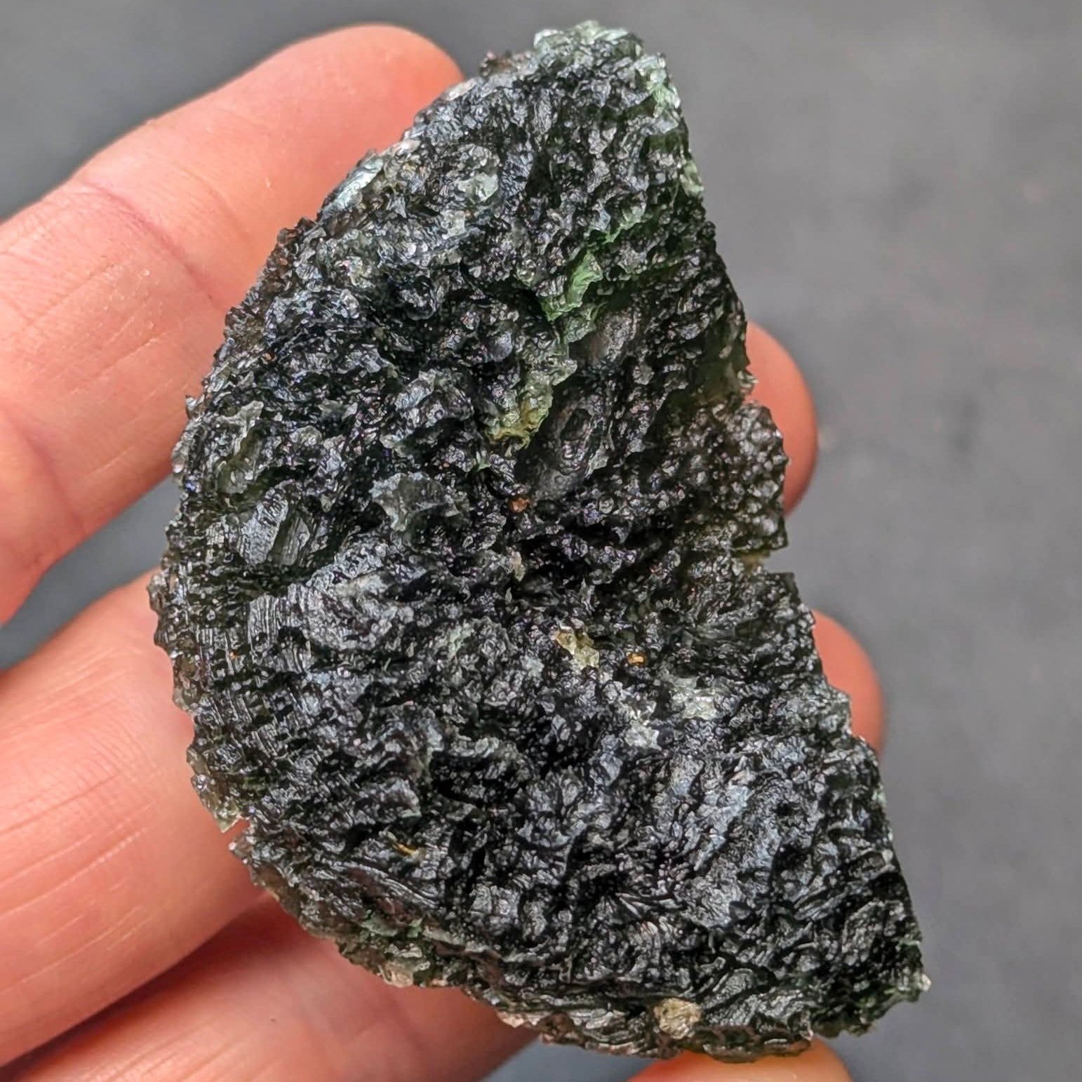 Natural moldavite from Krasejovka, 41 g half-disc -back side.